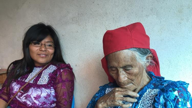 After 15 years of separation, Veronica Martinez Sanchez, left, and Sofia Gomez had the opportunity to reconnect in their Oaxacan village of San Bartolome Quialana. (Cindy Carcamo / Los Angeles Times).