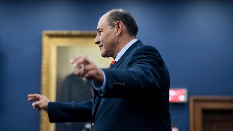 Rep.-elect Lou Correa (D-Santa Ana) reacts after drawing the No. 1 chip during the new member office lottery at the Capitol. (Bill Clark / CQ Roll Call) 